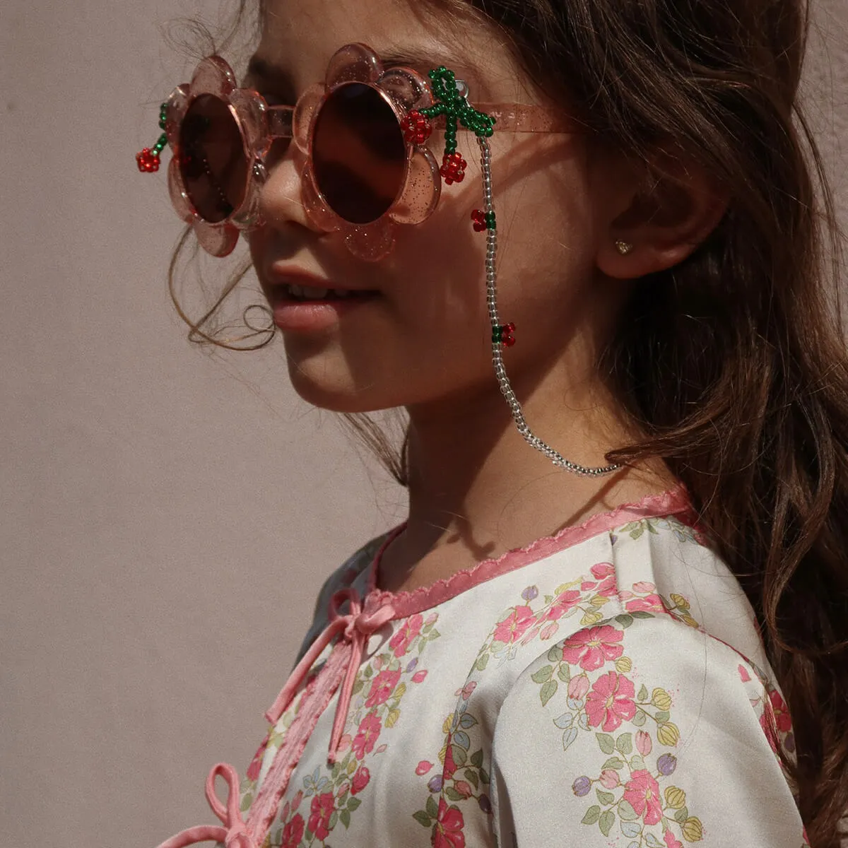 Junior Flower Sunglasses in Glitter Rose by Konges Sløjd