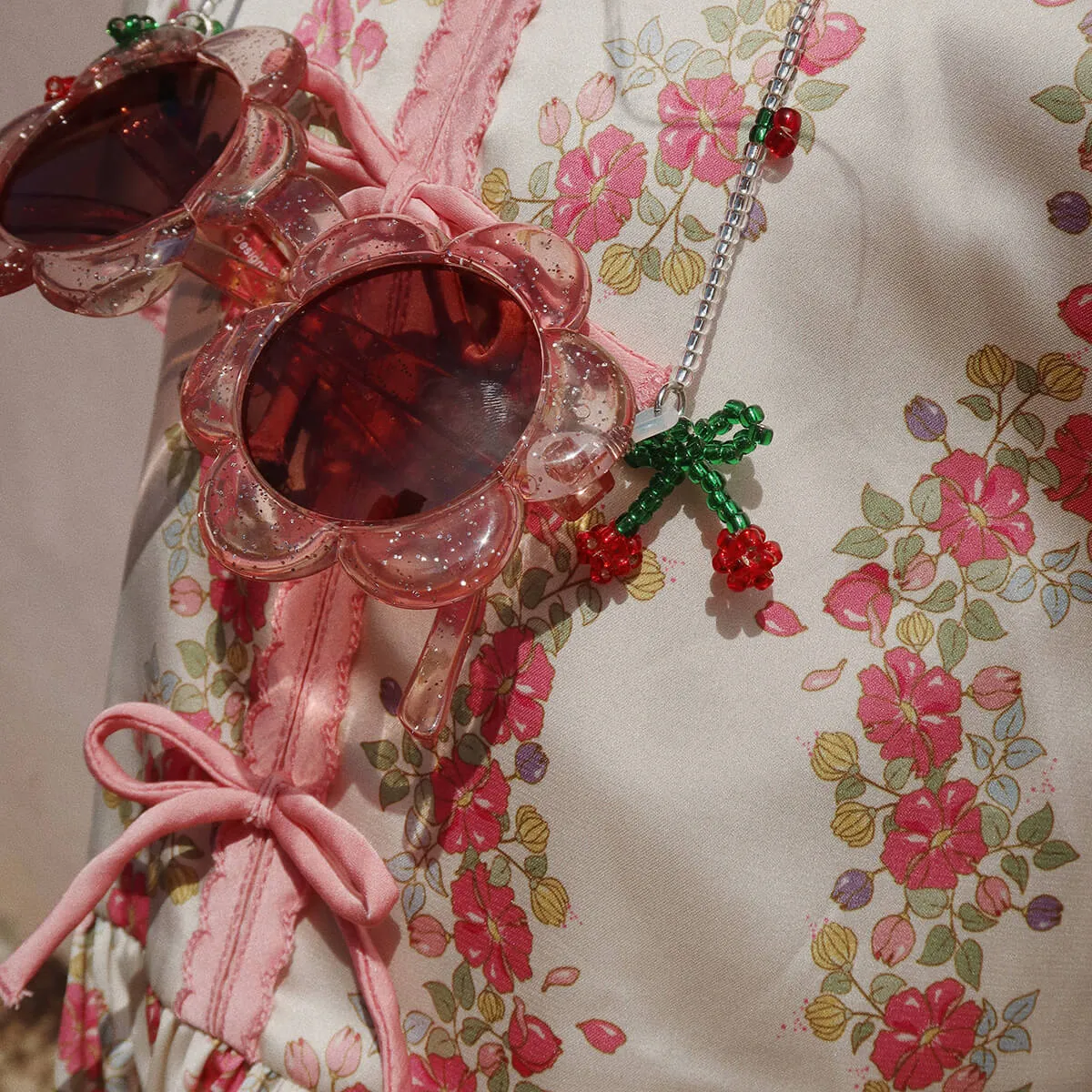 Junior Flower Sunglasses in Glitter Rose by Konges Sløjd