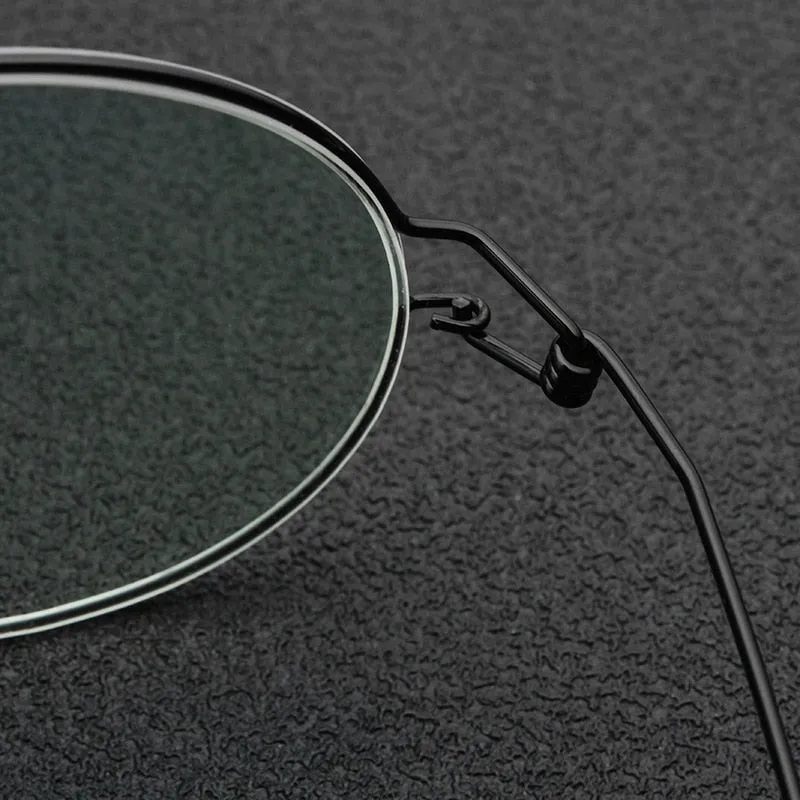 Yimaruili Unisex Full Rim Screwless Titanium Alloy Round Frame Eyeglasses 28607